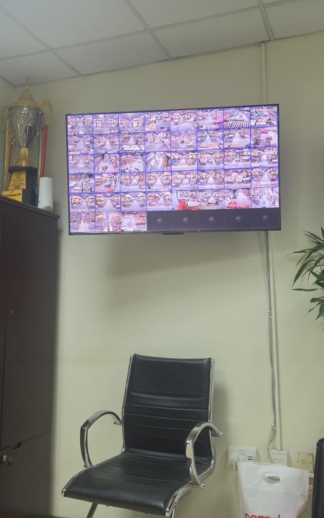CCTV monitoring wall with multi-camera grid display for warehouse security in Germany